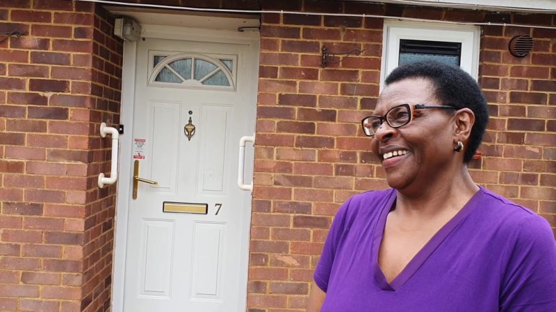 Rose outside her house